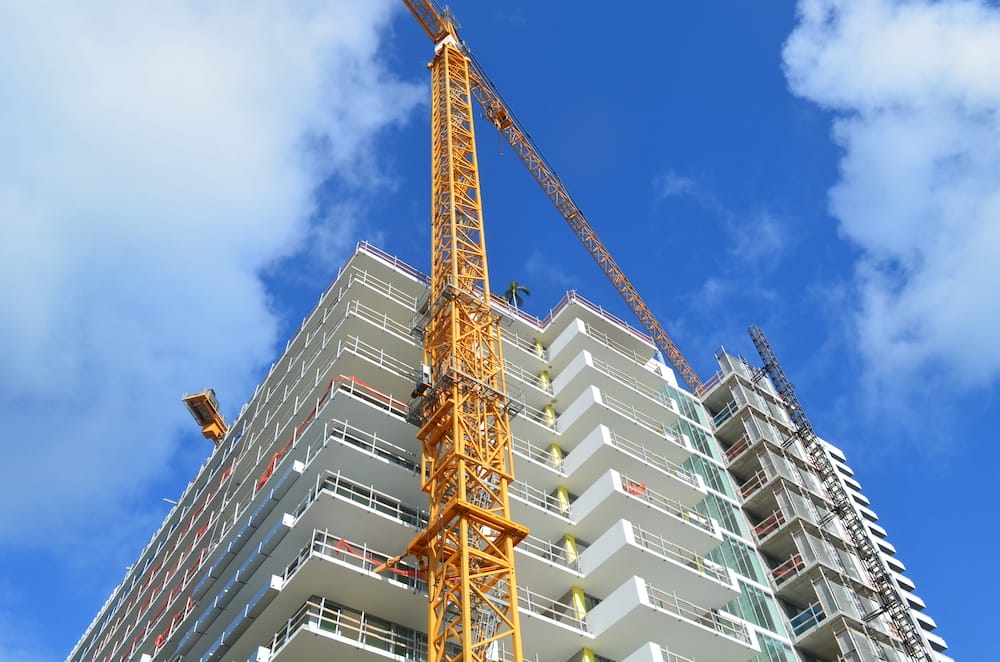 Luxury condo high-rise apartment buildings under construction. Luxury condo high-rise apartment buildings under construction.